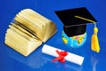 Graduation academic cap, diploma scroll, textbook book-a source of knowledge. The traditional ceremony of awarding diplomas of Royalty Free Stock Photo