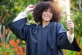 Graduation, achievement and woman student or graduate celebrate success on university or college campus. Happy Royalty Free Stock Photo