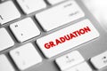Graduation is the award of academic degree, text concept button on keyboard