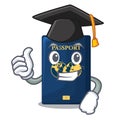 Graduation blue passport above character wooden table