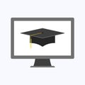 Graduation cap with gray computer Royalty Free Stock Photo