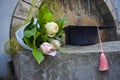 Graduation cap or mortaboard with a bunch of roses on the old stairs  in the graduation day Royalty Free Stock Photo