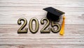 Graduation Cap with 2025 Numbers on Rustic Wooden Background â Flat Lay with Copy Space Royalty Free Stock Photo