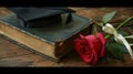 Graduation cap with red rose on books Royalty Free Stock Photo