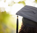 Graduation cap, thinking and woman outdoor planning future with education achievement. University or college graduate Royalty Free Stock Photo