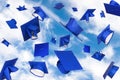 Graduation caps in flight Royalty Free Stock Photo