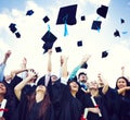 Graduation Caps Thrown in the Air Royalty Free Stock Photo