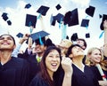 Graduation Caps Thrown in the Air Royalty Free Stock Photo