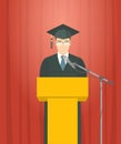 Graduation ceremony speech by a man graduate at the podium