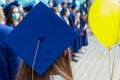 Graduation day. The back of a graduate wearing square, quadrangular academic cap