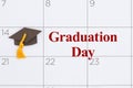 Graduation Day schedules on calendar with a grad cap for education message Royalty Free Stock Photo
