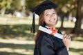 Graduation, education diploma and portrait of girl with smile for success, award and achievement. University, college