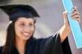 Graduation, hand and woman with scroll on university campus for education achievement. Pride, future and female student Royalty Free Stock Photo