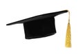 Graduation hat with gold tassel isolated Royalty Free Stock Photo