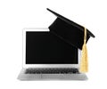 Graduation hat with gold tassel and laptop isolated on white Royalty Free Stock Photo