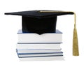 Graduation hat with gold tassel and stack Royalty Free Stock Photo