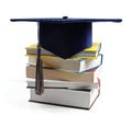 Graduation hat and stack of books isolated on white Royalty Free Stock Photo