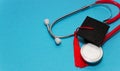 graduation medical concetp. Graduation cap and stethoscope on blue background