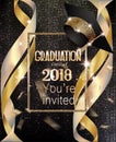 Graduation party invitation card with golden ribbons and background with circle pattern.