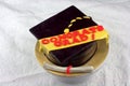 Graduation shaped fondant cake Royalty Free Stock Photo