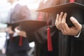 Graduation,Student hold hats in hand during commencement success graduates of the university,Concept education congratulation.Grad