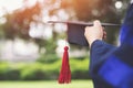 Graduation,Student hold hats in hand during commencement success graduates of the university,Concept education congratulation.Grad