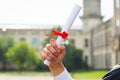 Graduation: Student Standing With Diploma