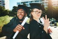 Graduation, students and happy for success, achievement or silly together outdoor. Portrait, man and woman smile, for Royalty Free Stock Photo