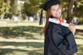 Graduation, university diploma and portrait of girl on campus with smile for success, award and achievement. Education