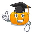 Graduation yellow pumpkin in the cartoon shape