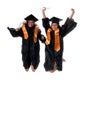 Gradutes jumping Royalty Free Stock Photo