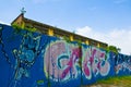 The graffiti before an abandoned factory.