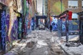 Graffiti in an alley in the Kensington Market. car on the background of graffiti Royalty Free Stock Photo