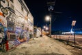 Graffiti Alley at night, in the Station North District, of Baltimore, Maryland. Royalty Free Stock Photo