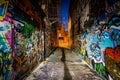 Graffiti Alley at night, in the Station North District, of Baltimore, Maryland. Royalty Free Stock Photo