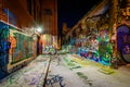 Graffiti Alley at night, in the Station North District, of Baltimore, Maryland. Royalty Free Stock Photo