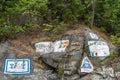 Graffiti along harbor dock boardwalk, Skagway, Alaska, USA