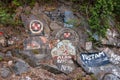 Graffiti along harbor dock boardwalk, Skagway, Alaska, USA