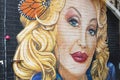 Graffiti art one a wall of Dolly Parton Royalty Free Stock Photo