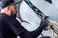 Graffiti artist in action. Royalty Free Stock Photo