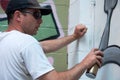 Graffiti Artist At Work On Mural Royalty Free Stock Photo