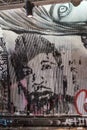 Graffiti artwork on corrugated metal depicts the face of Martin Luther King. Leake street, UK Royalty Free Stock Photo