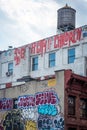 Graffiti atop Chinatown rooftops in New York City