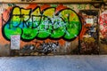 Graffiti background ideal for photographers. Urban art message. Royalty Free Stock Photo