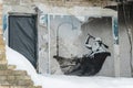 Graffiti by Banksy in a destroyed house in Gorenka, Ukraine