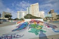 Graffiti on beach walkway with skyline of Durban skyline, South Africa on the Indian Ocean