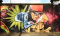 Graffiti caricature of a jockey on a wall