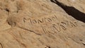 Graffiti carved into the rocks at Grapevine Lake Texas.