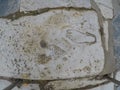 Graffiti carved into a slab of marble, Ephesus, Turkey