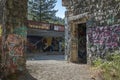 Graffiti covered remnants of the ruins of an old resort hotel at Sooke Potholes Provincial Park